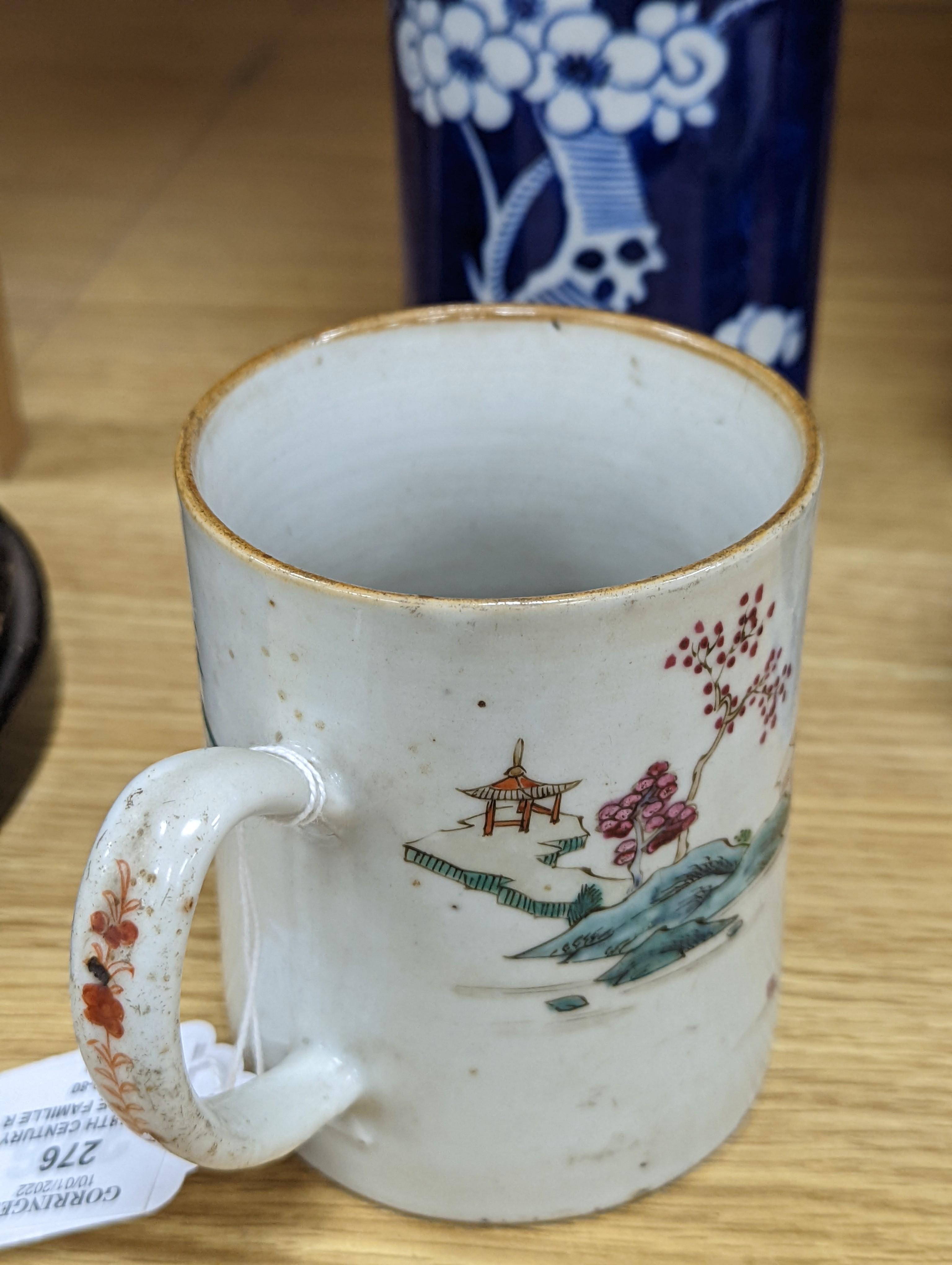 An 18th century Chinese famille rose mug, a Chinese Imari tea caddy and two Chinese blue and white sleeve vases 30cm (4)